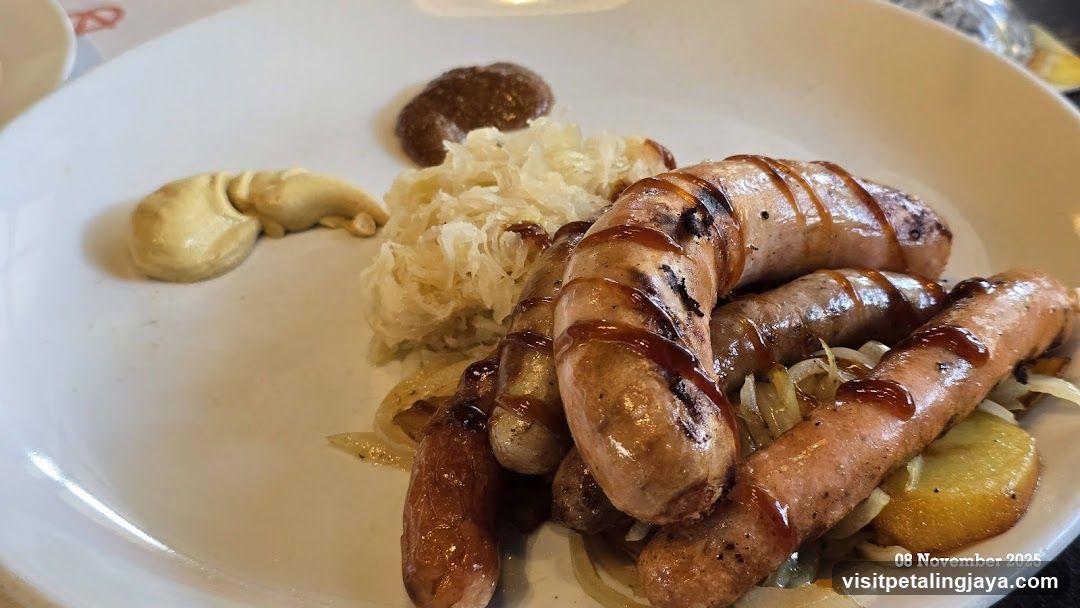 Grilled Sausages with Sauerkraut and Potatoes