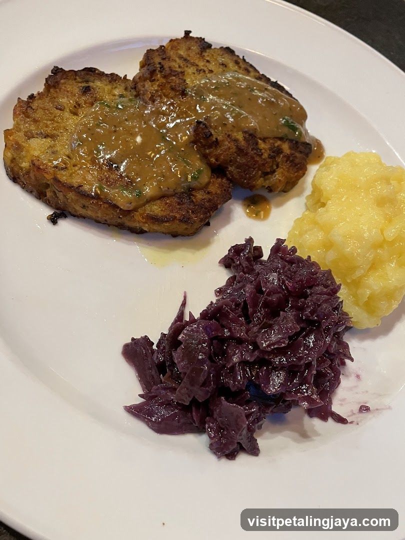 Plate of Food with Sauce and Side Dishes