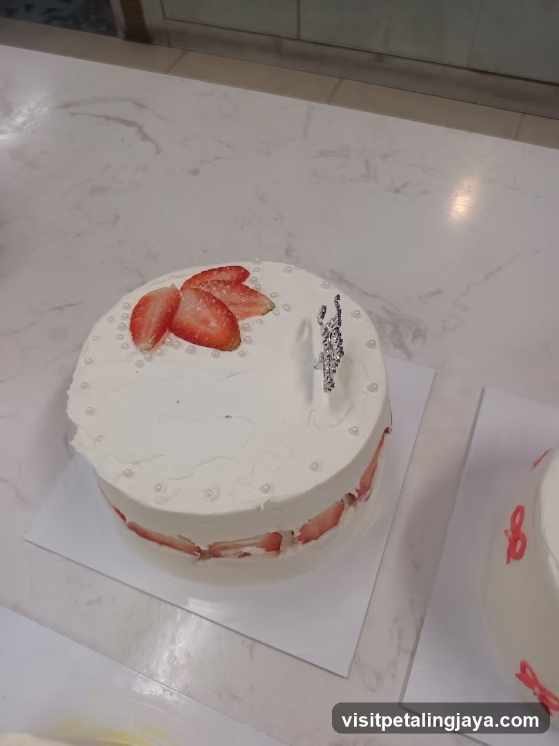 Strawberry Cake with White Frosting