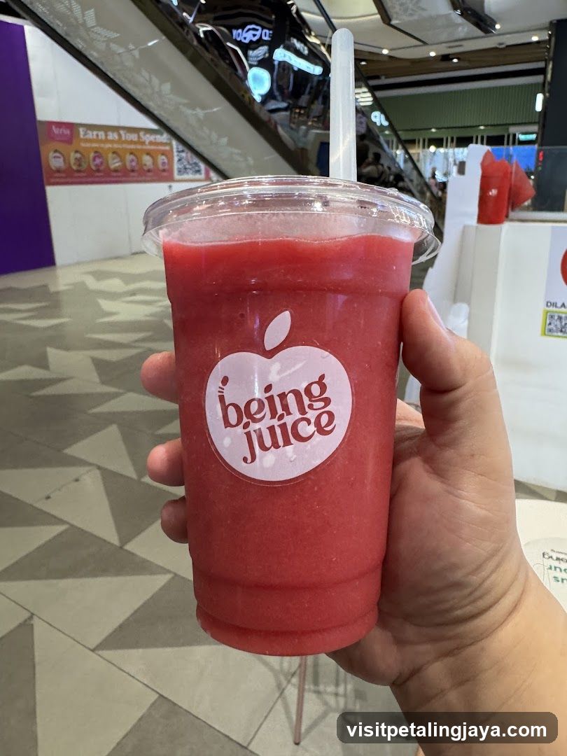 being juice drink in mall