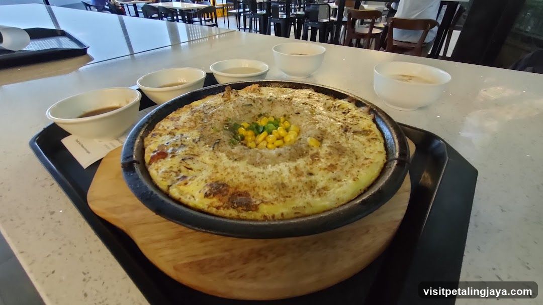 Sizzling Dish with Corn and Peas