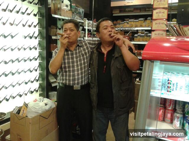 Men smoking in a convenience store