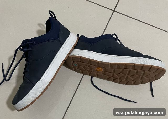 Blue Sneakers on Tiles