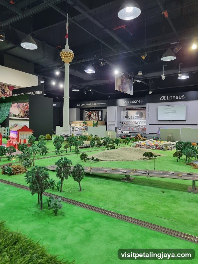 Model City Display with Tower and Retail Background