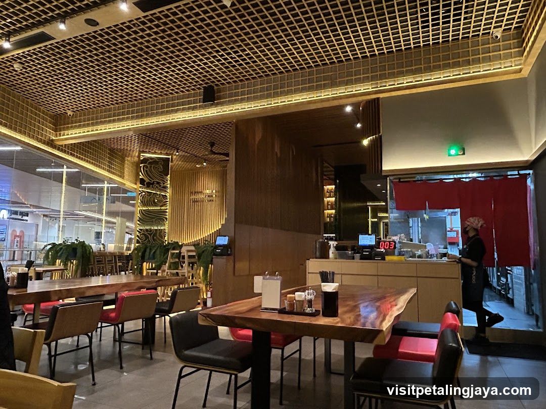 Restaurant Interior with Wooden Tables and Staff