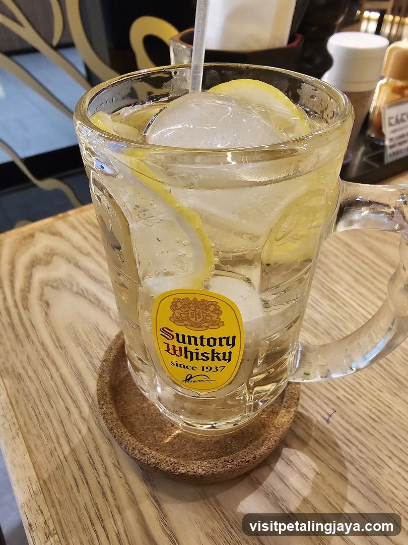 Suntory Whisky Glass with Lemon and Ice