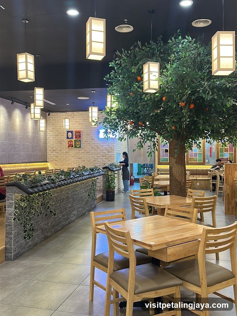 Restaurant Interior with Decorative Tree and Lighting