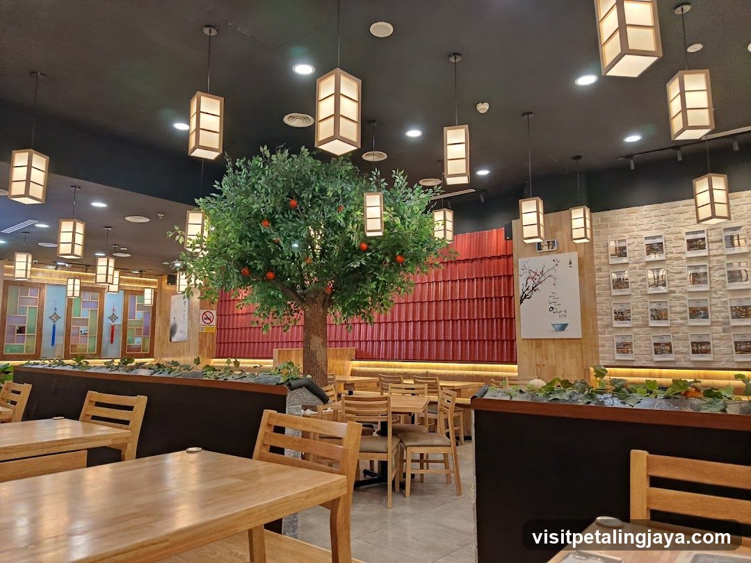 Restaurant Interior with Decorative Tree and Lighting