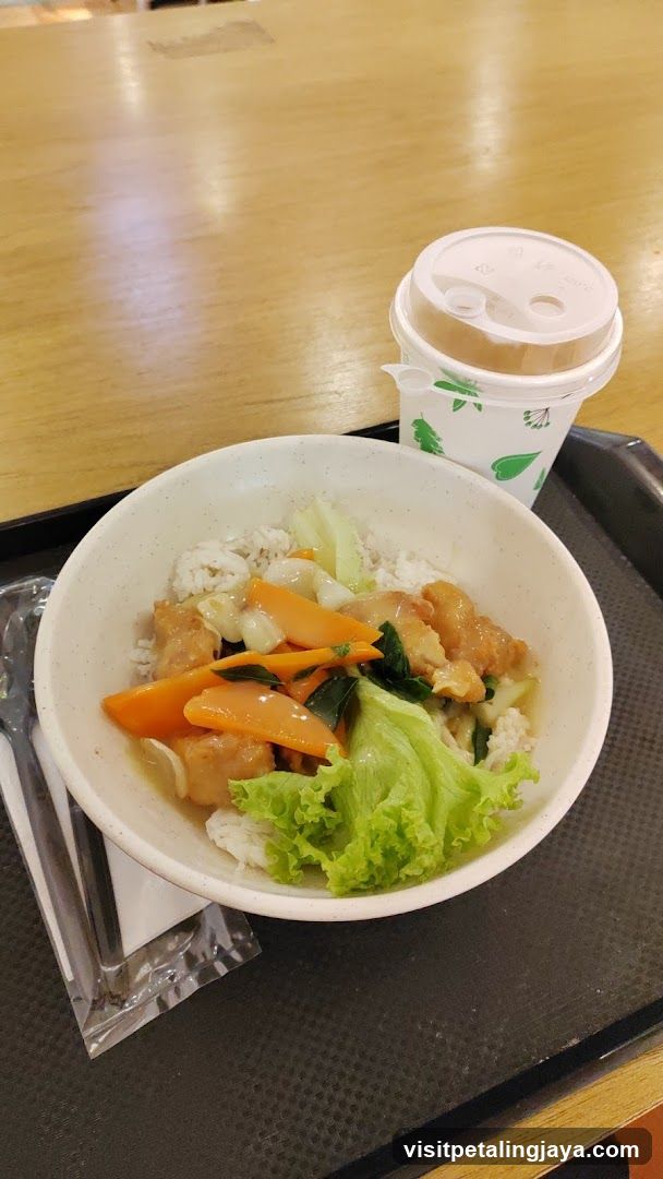 Bowl of Rice with Vegetables and Drink