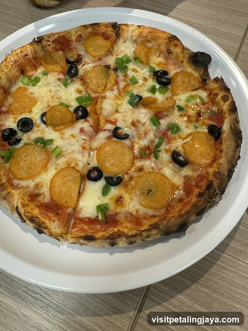 Pizza with Pepperoni, Olives and Green Peppers