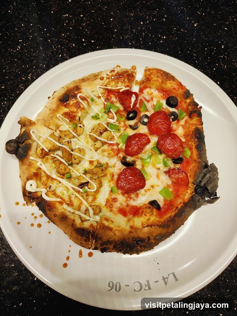 Pizza with mixed toppings on a white plate