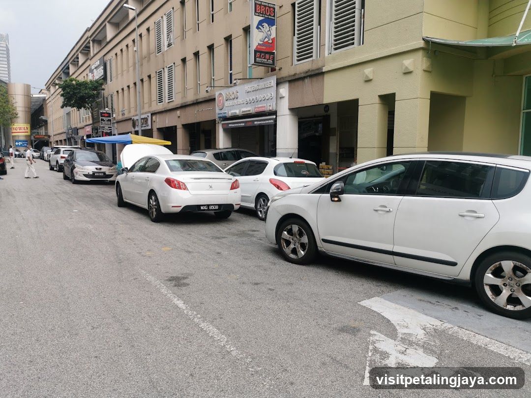 Street Scene with Parked Cars and Buildings