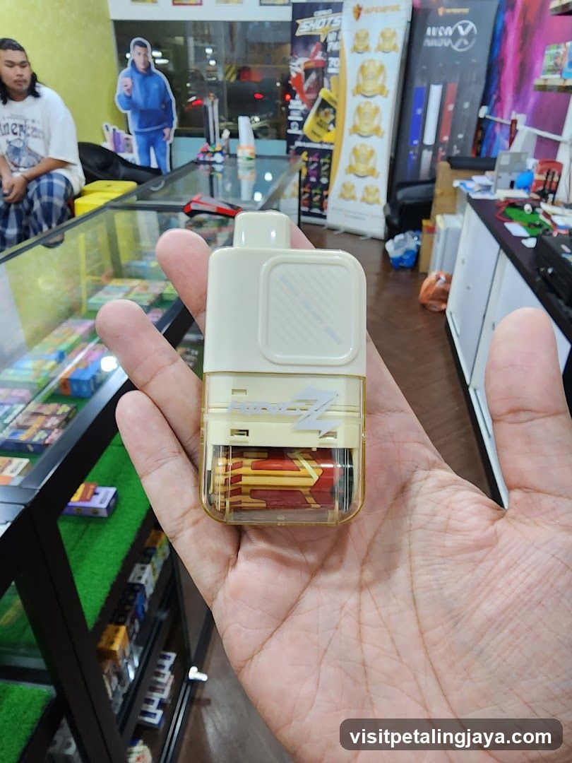 Hand holding vape device in store