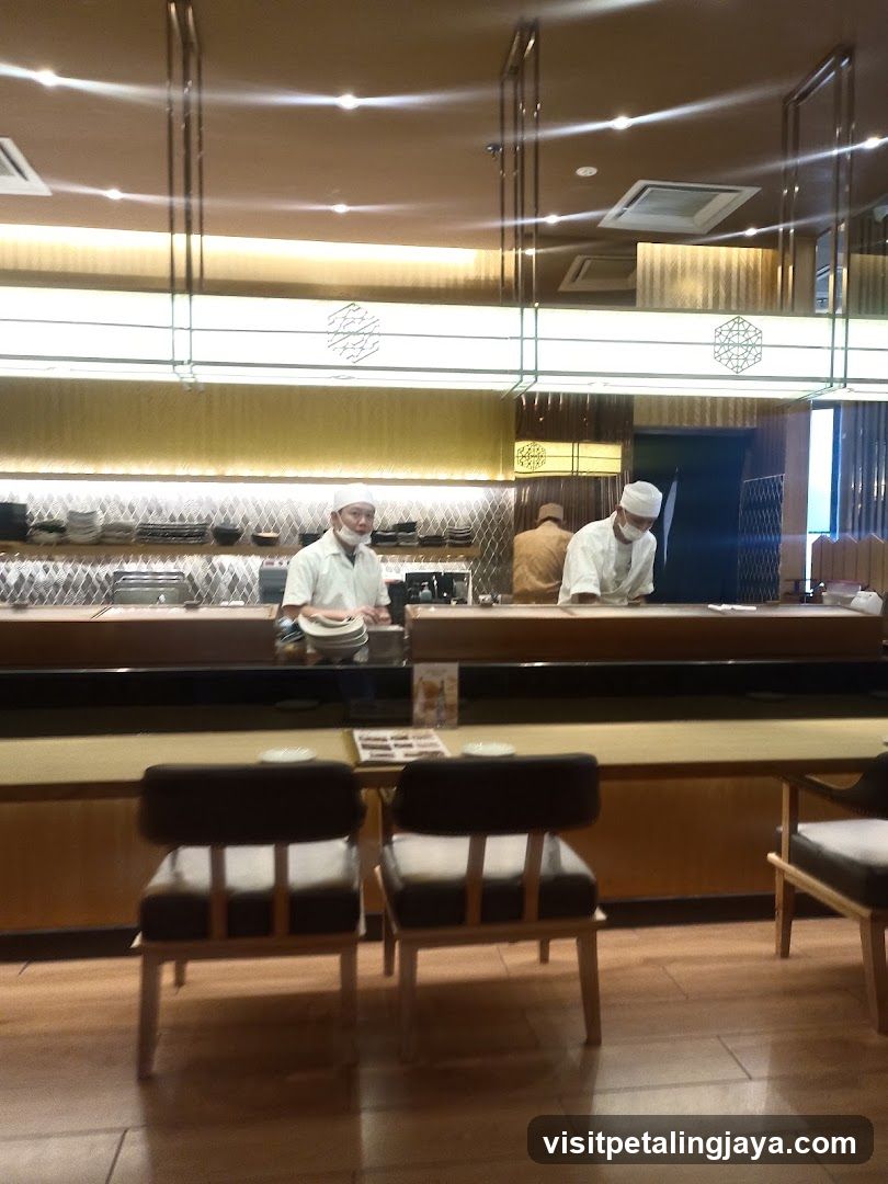 Restaurant Interior with Chefs at Counter