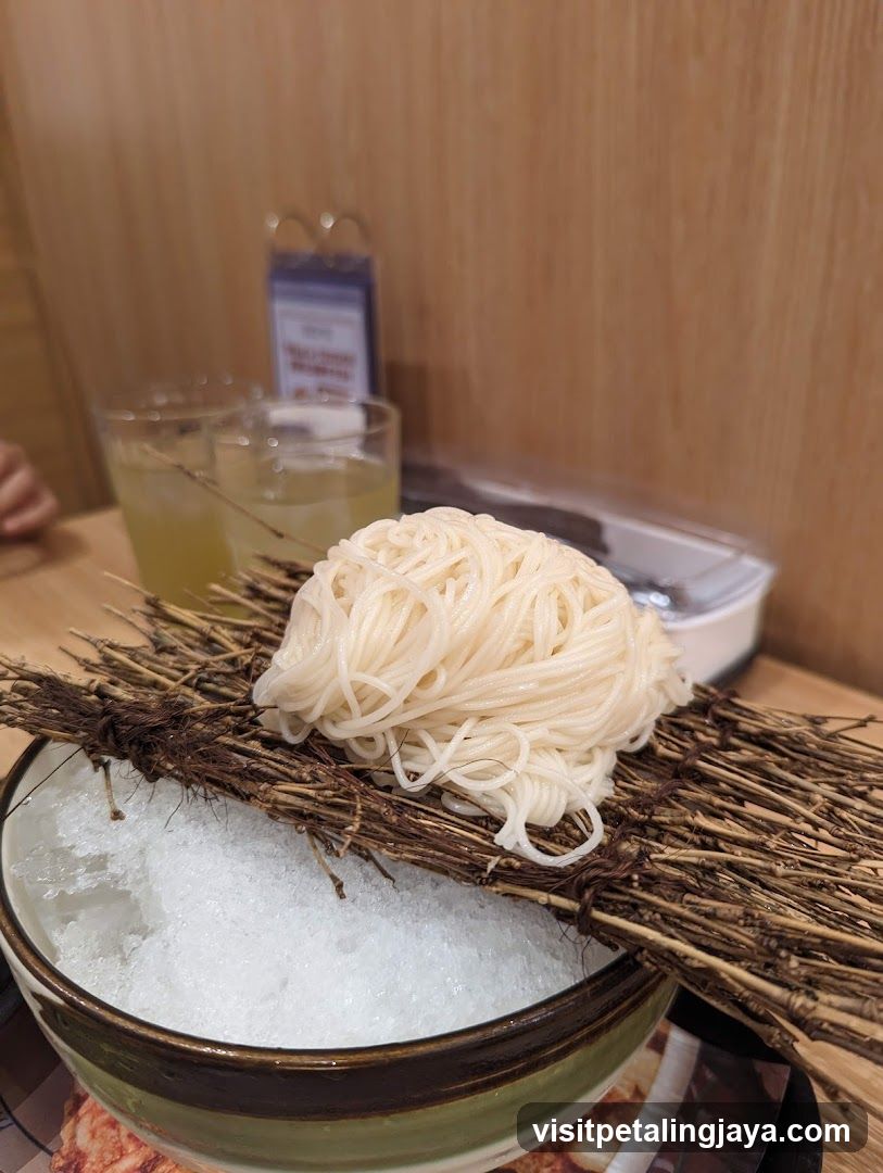 Noodle Dish with Ice and Straw