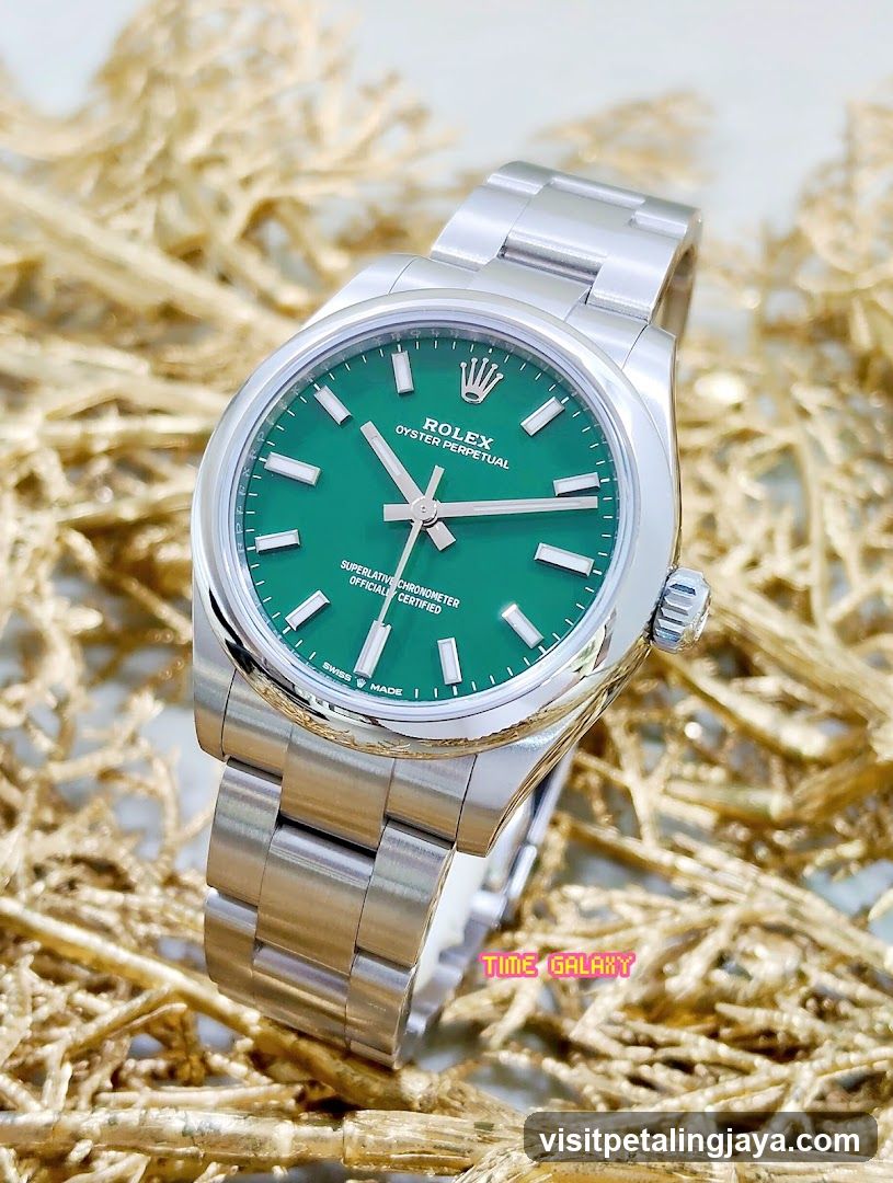 Rolex Oyster Perpetual Date Watch with Green Dial