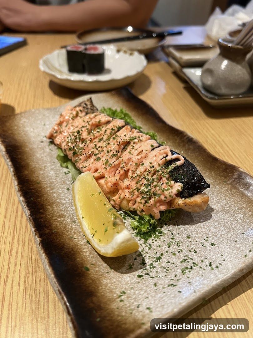 Grilled Fish with Sauce and Lemon