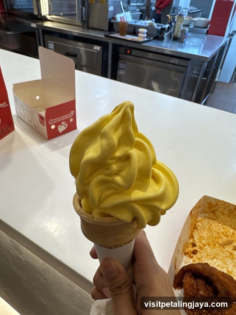 Yellow Soft Serve Ice Cream Cone
