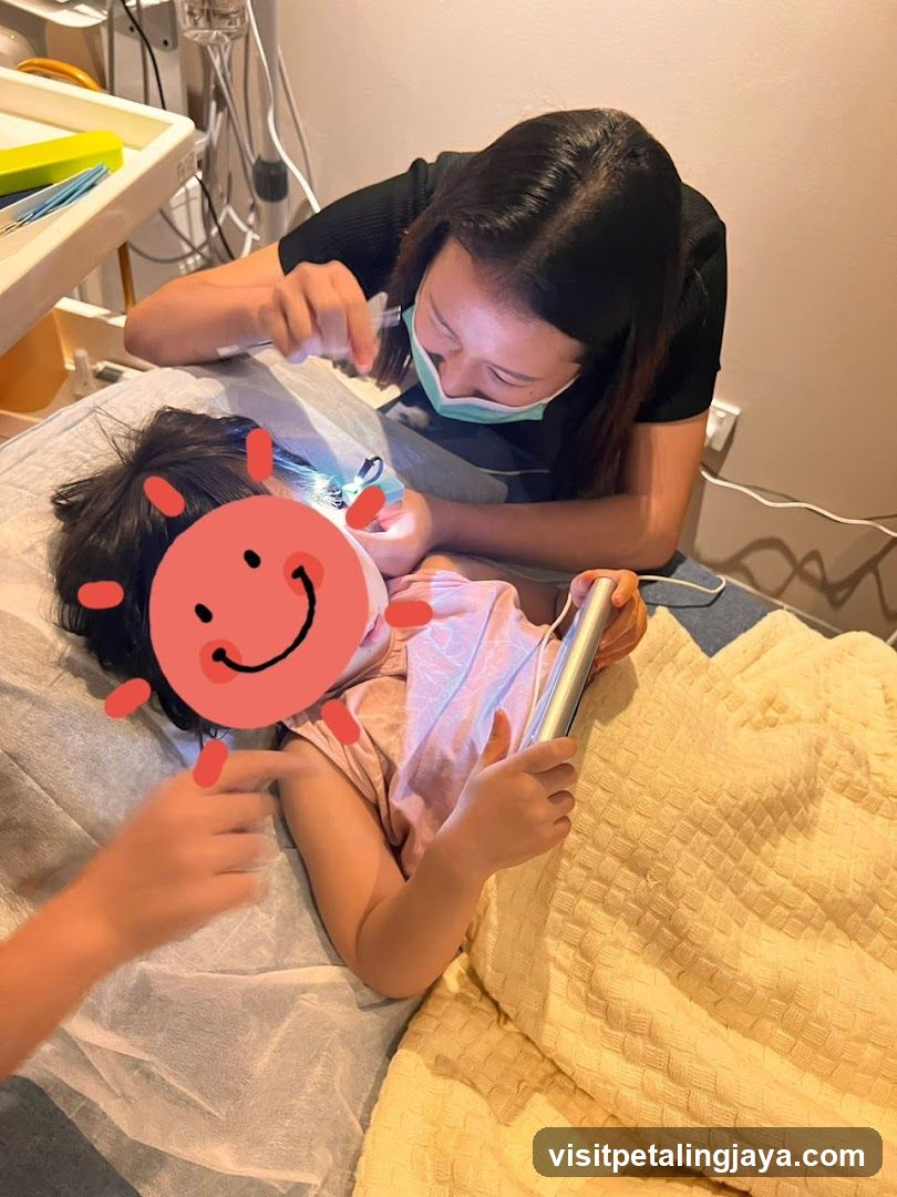 Child Dental Visit with Tablet Entertainment