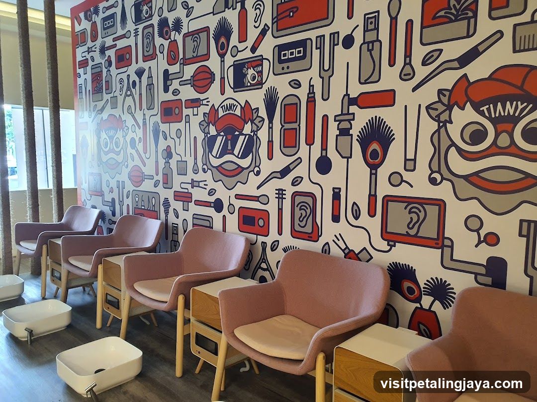 Interior of a salon or spa with colorful wall art and pink chairs