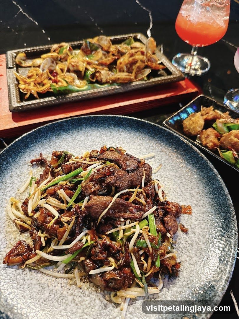 Food Spread with Stir-fried Meat and Clams