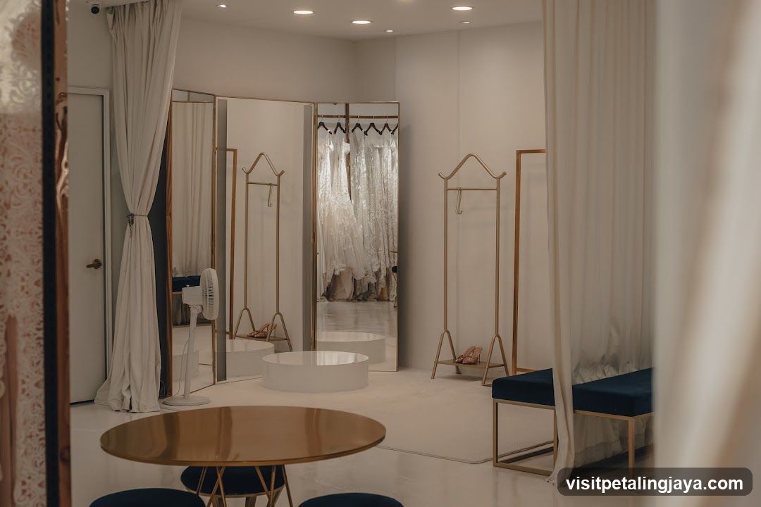 Boutique Interior with White Dresses and Mirrors