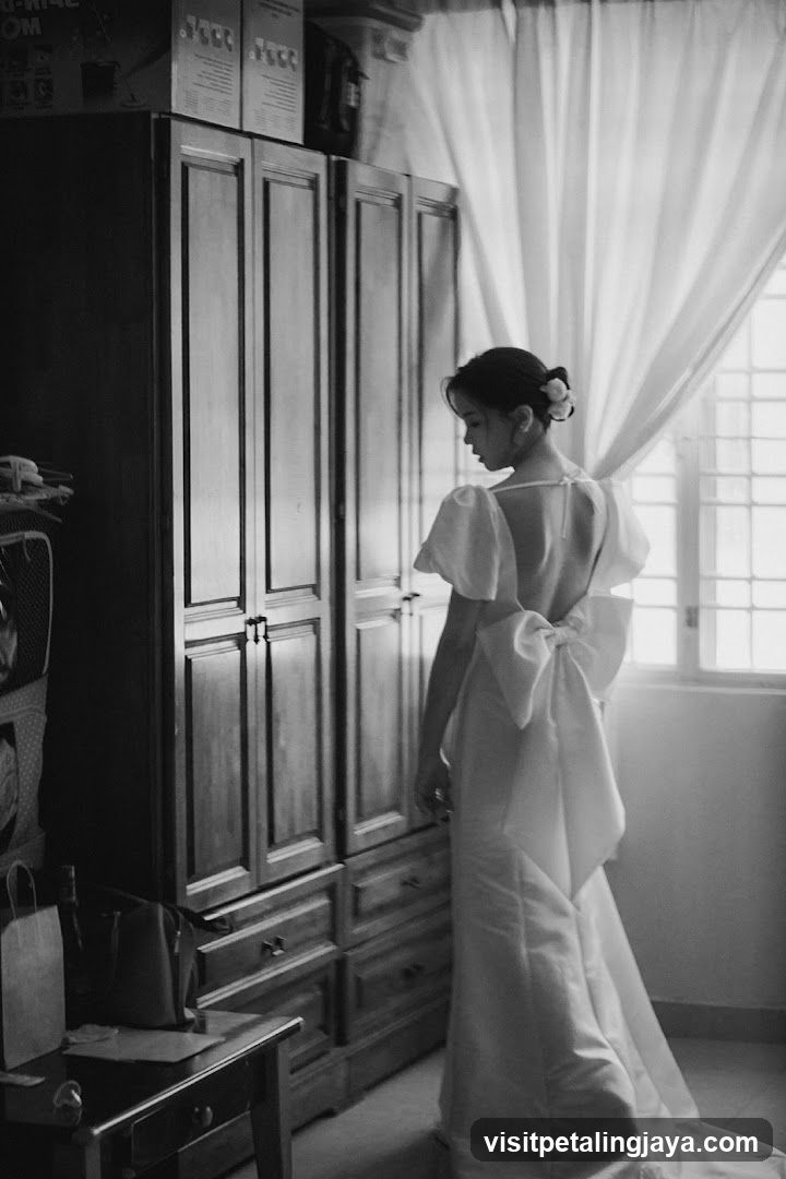 Bride in White Dress by Window