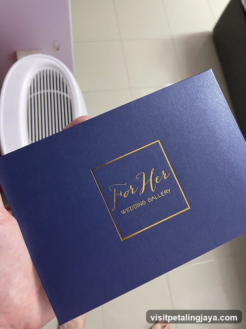 Blue Gift Box with Gold Foil Text