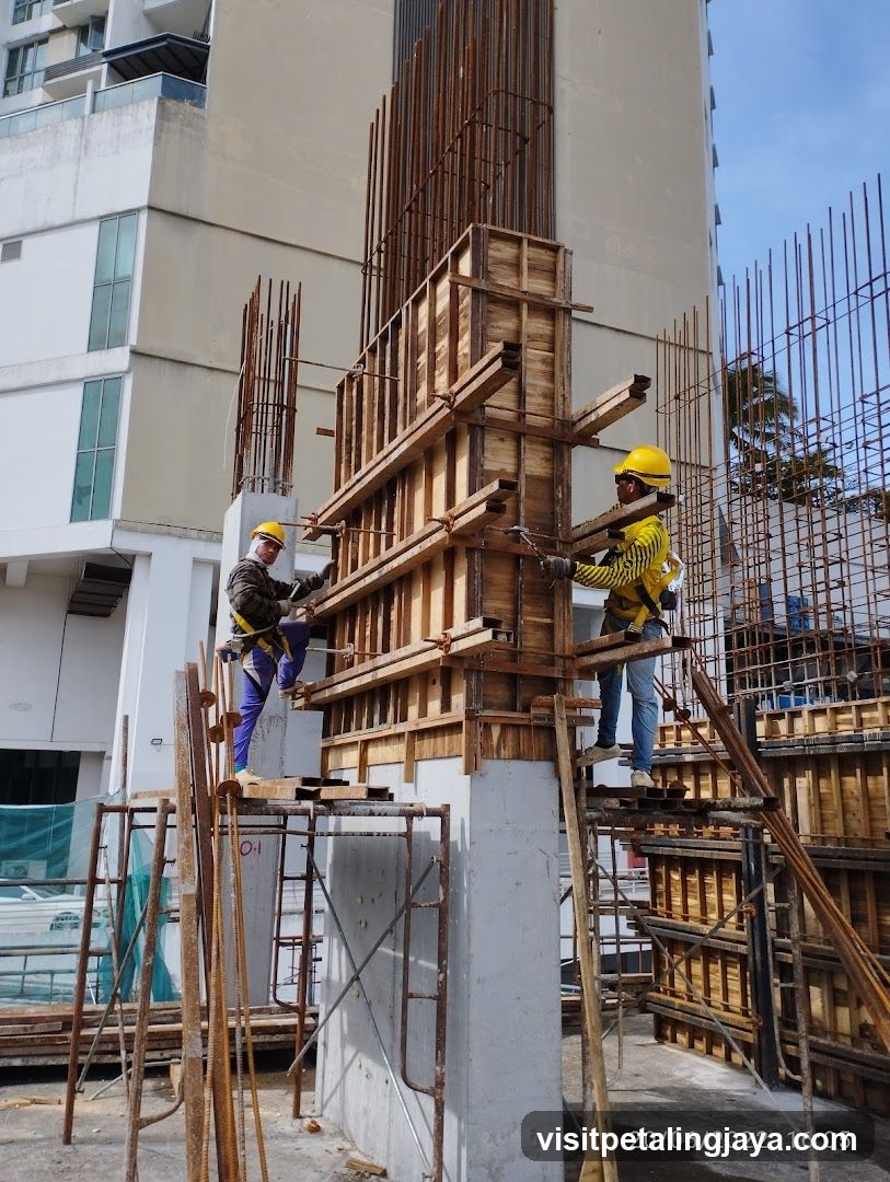Construction Site Workers on Scaffolding