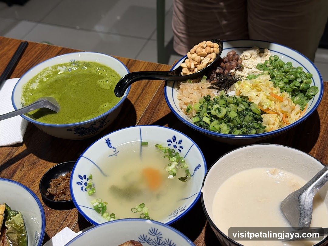 Food Table with Bowls of Soup and Side Dishes