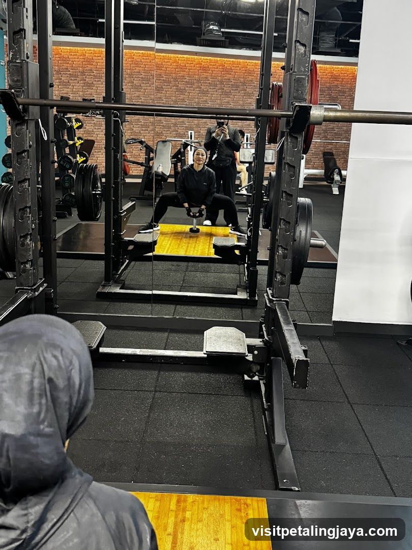Gym Interior with Squat Rack and Mirror Reflection