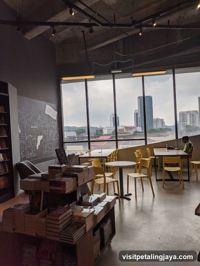Interior of a modern bookstore or cafe with city view