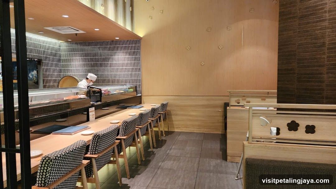 Restaurant Interior with Chef and Counter Seating