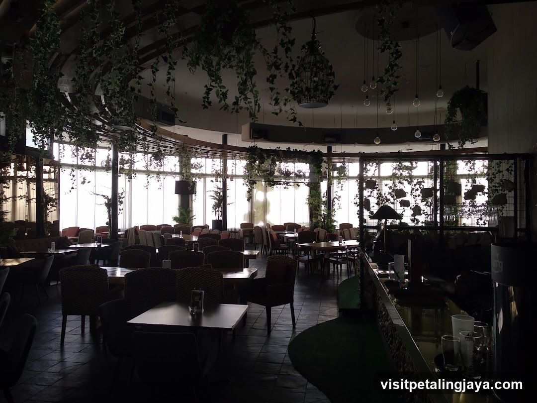 Interior of a plant-filled restaurant or cafe