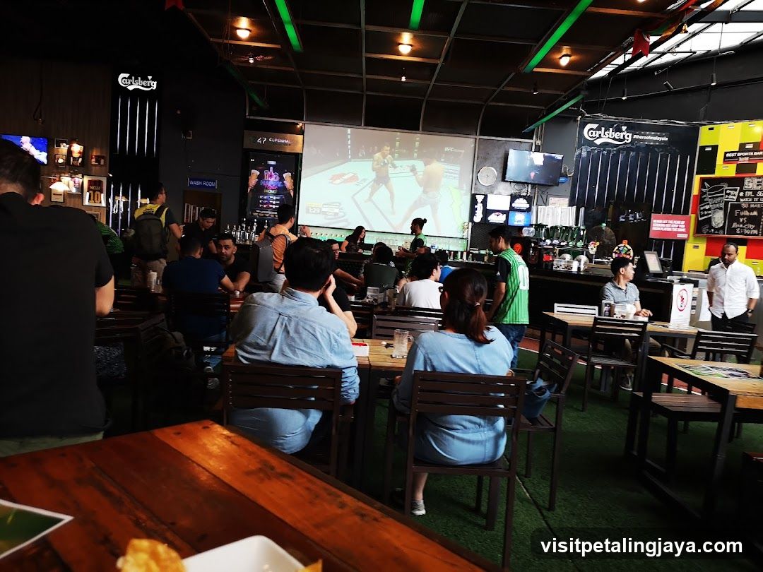 Bar Interior with Boxing Match Projection
