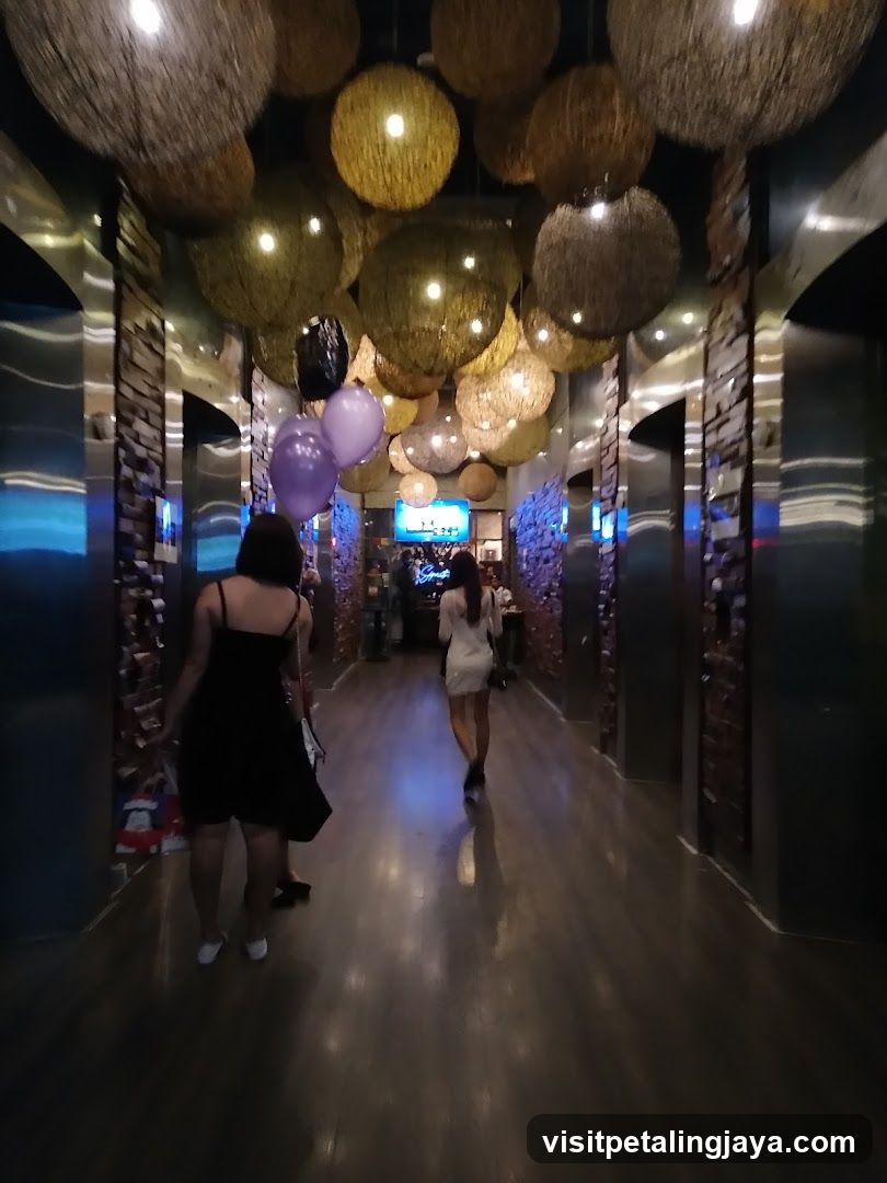 Decorated Hallway with Hanging Spheres