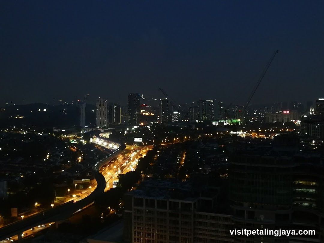Night Cityscape with Highway and Skyscrapers