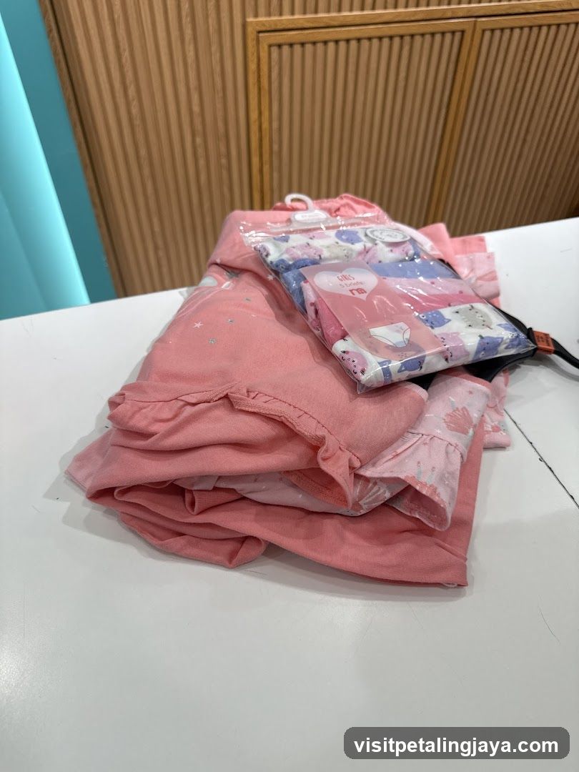 Pink Clothing and Accessories on Table