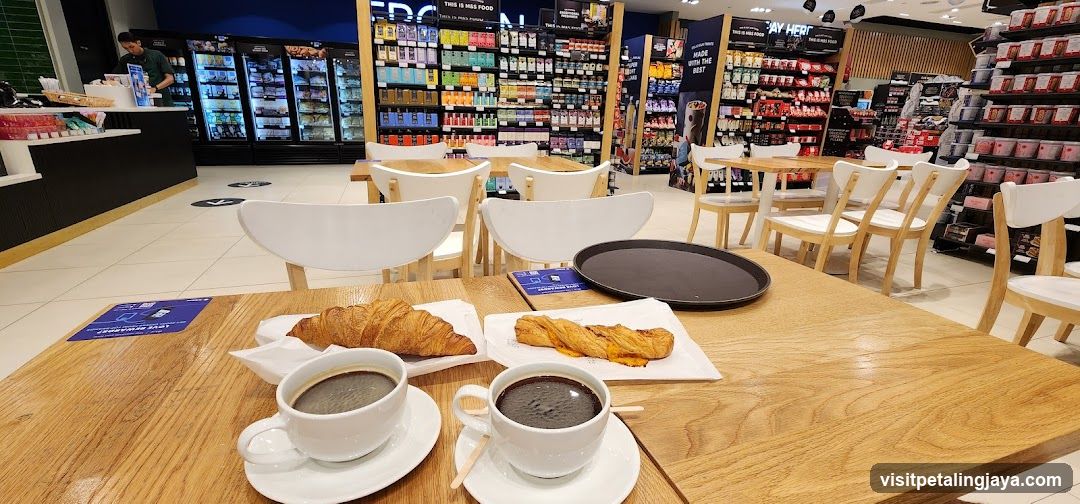 Coffee Shop Interior with Croissants and Coffee