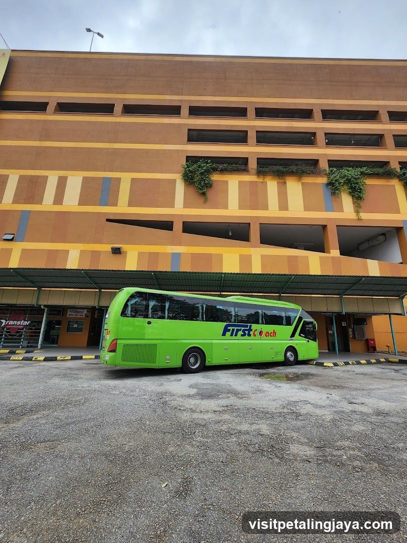 Green Bus in Parking Area