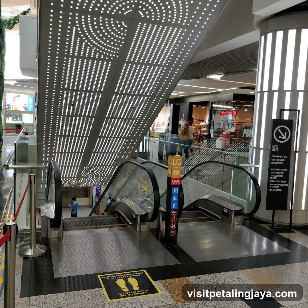 Mall Interior with Escalator and Signage
