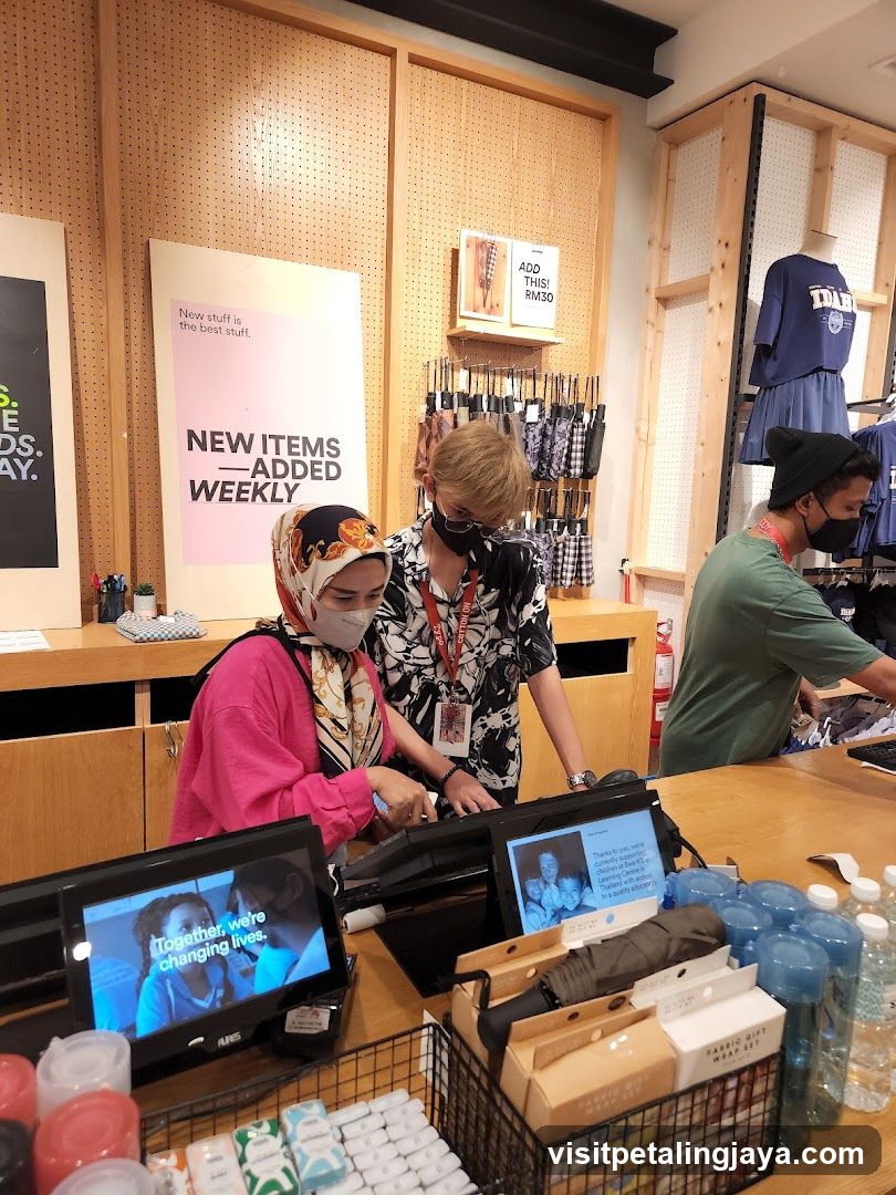 Store Interior with Staff and Customers