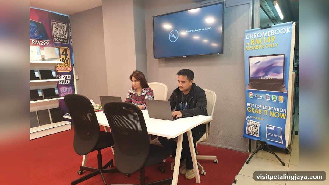 Tech Store Interior with Dell and Chromebook Promotion