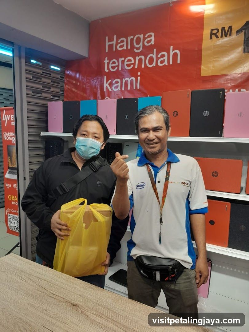 Two men in a tech shop