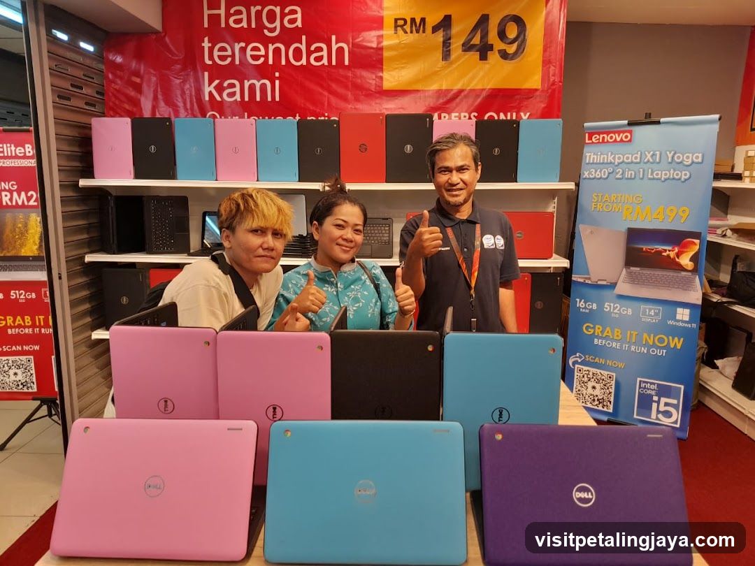 Laptop Display with Staff and Promotional Banners