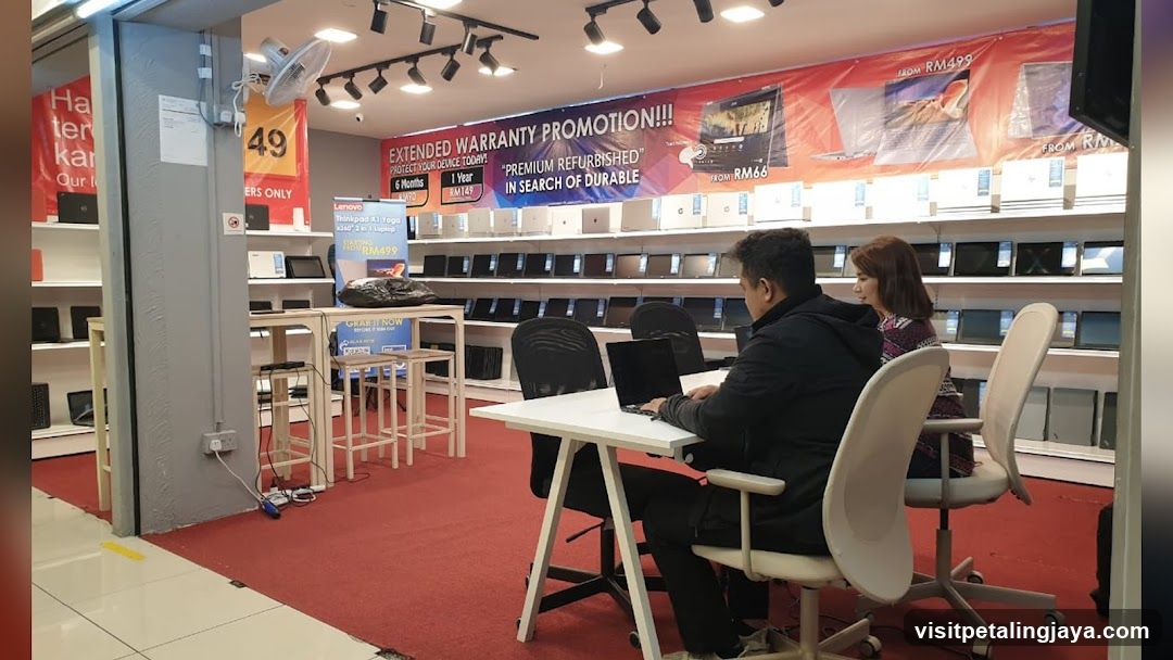 Electronics Store Interior with Extended Warranty Promotion