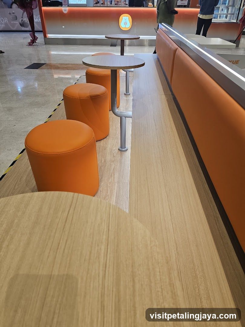 Orange Seating Area in Mall