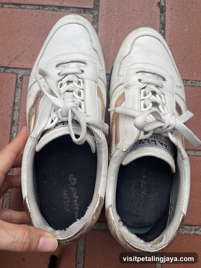 White Sneakers with Gold Accents