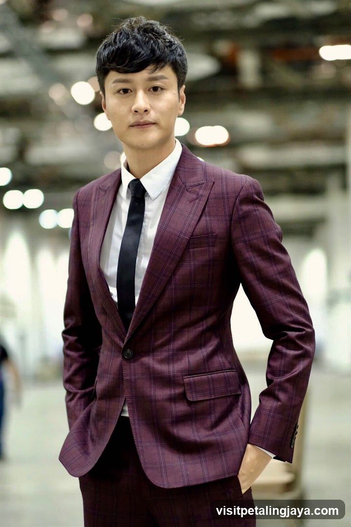 Man in Maroon Suit
