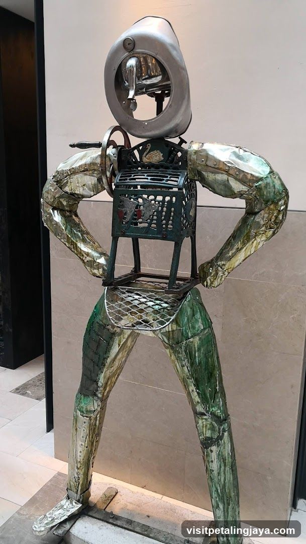 Metal Sculpture with Shopping Basket